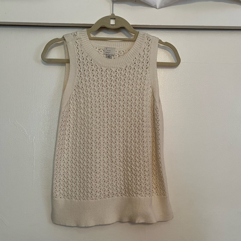 Tank top sweater.
